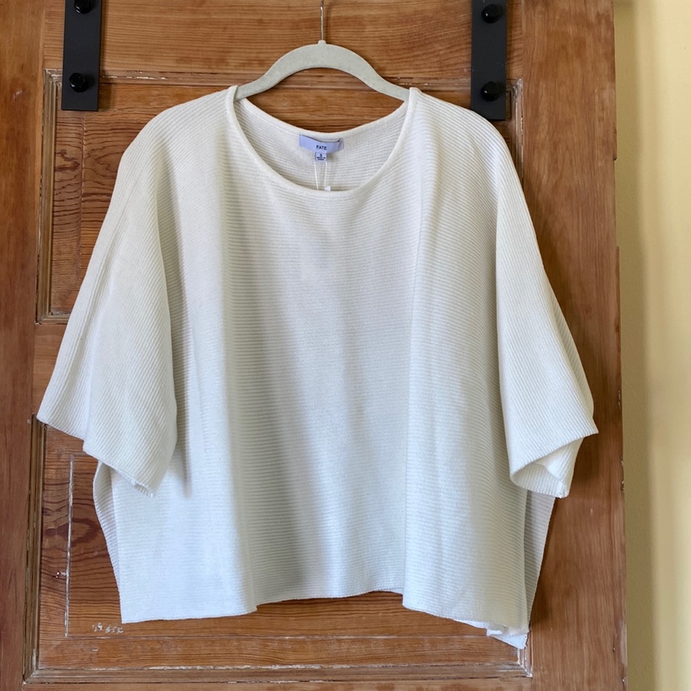 White shirt sleeve sweater